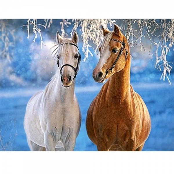 Hästar i snölandskap