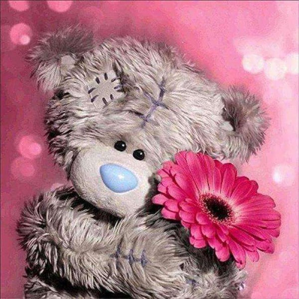 Nallebjörn med blomma